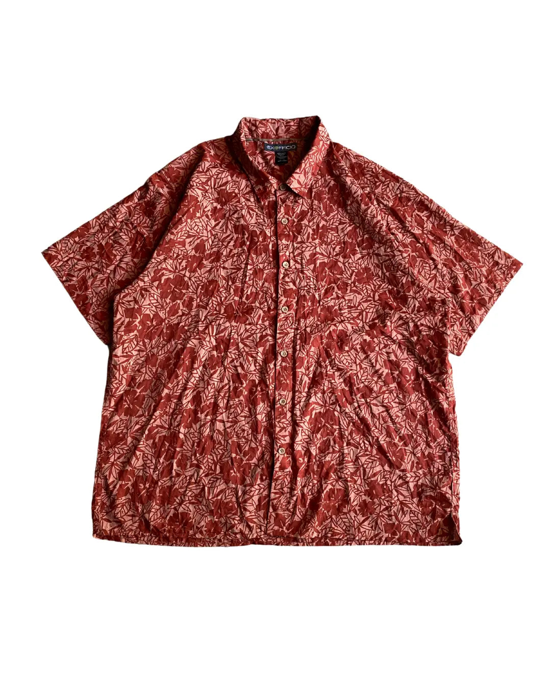 Camisa playera con detalles florales Coralu